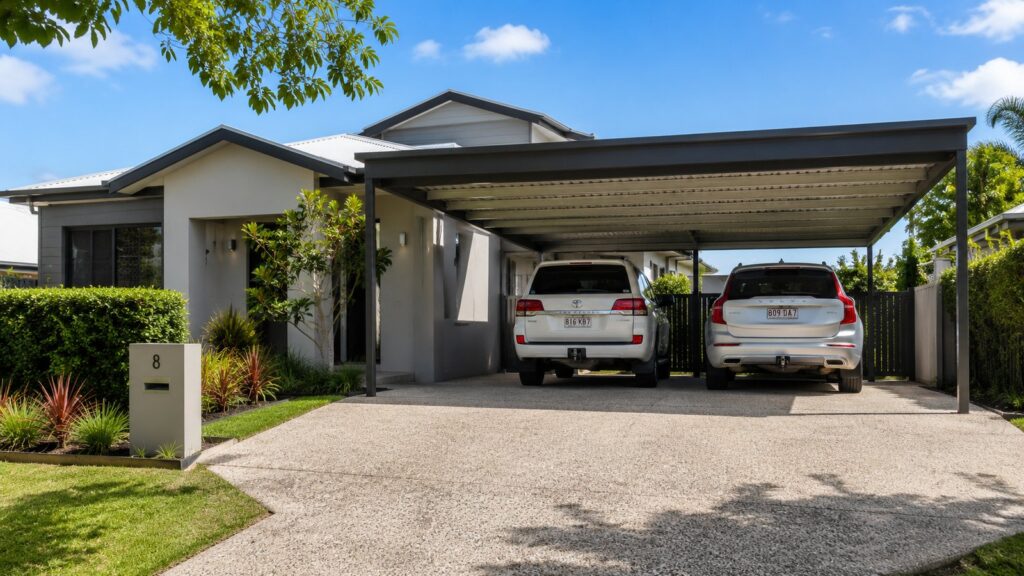 Carport Parkwood 2 Custom Colorbond double carport protecting two SUVs at a modern Parkwood home.