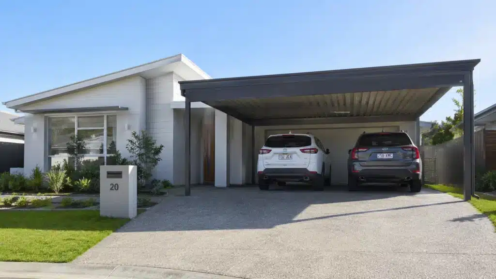 Carport Pimpama 2 Modern Pimpama home with a Colorbond double carport protecting two family SUVs.
