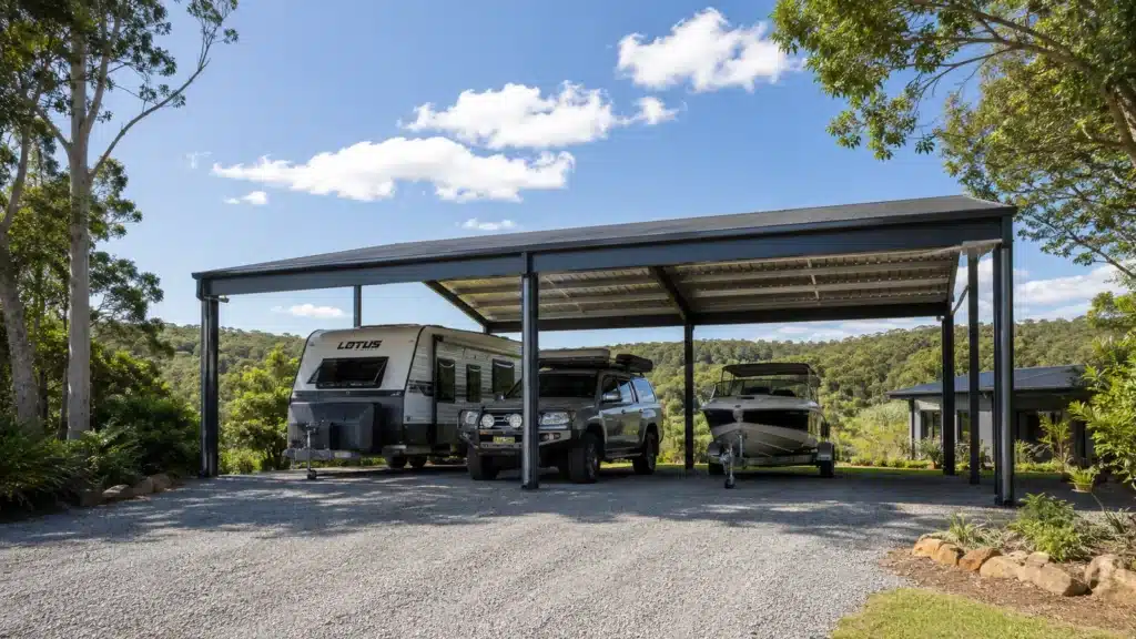 Carport Worongary 3 High-clearance freestanding carport covering a caravan, 4WD and boat on a Worongary acreage block.